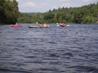 Kayak and tubing on the river